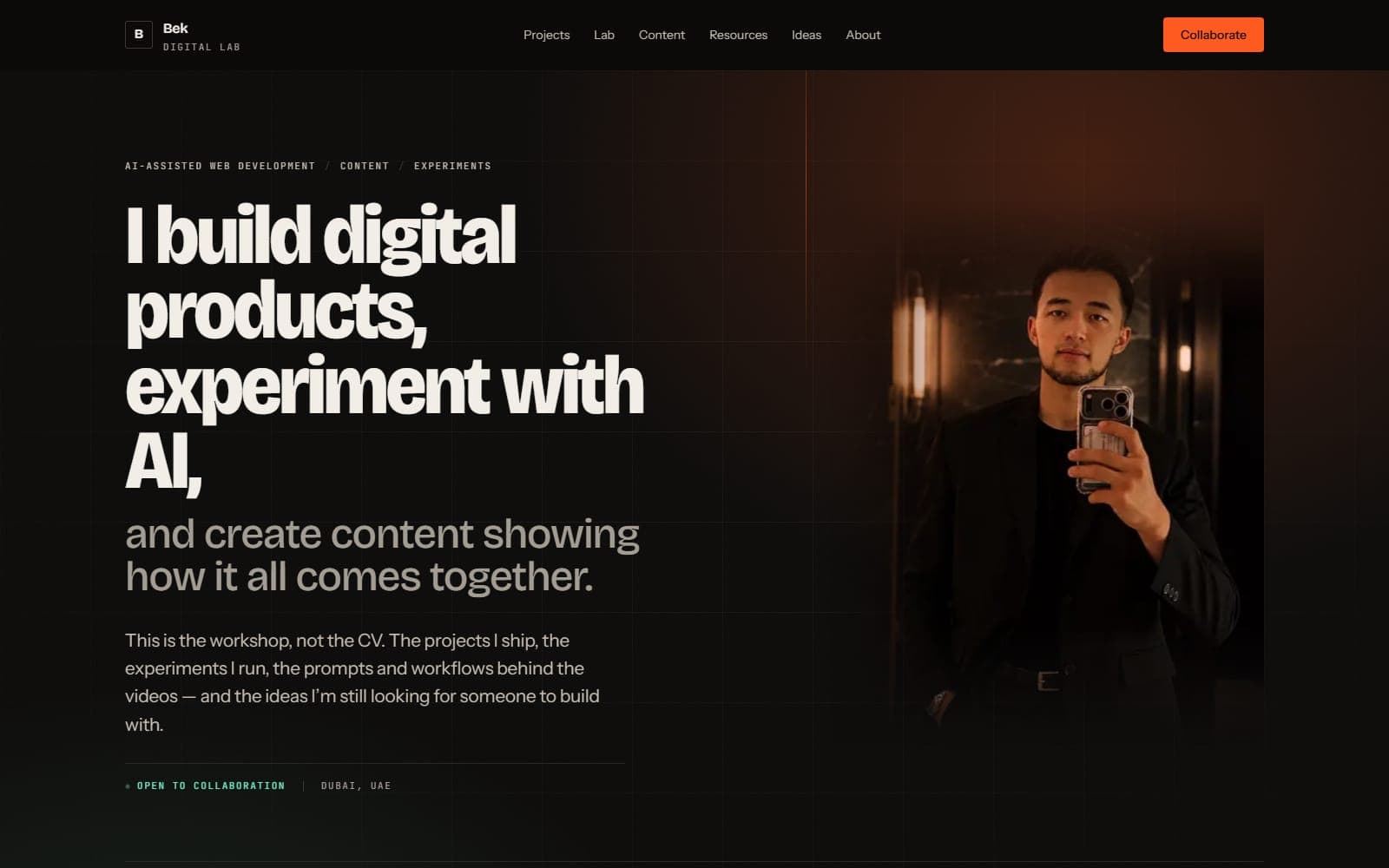 The homepage of this site — a bold condensed headline on a warm near-black ground, with a portrait edge-faded into the background on the right
